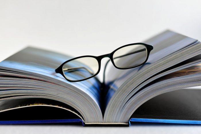 eye glasses on book